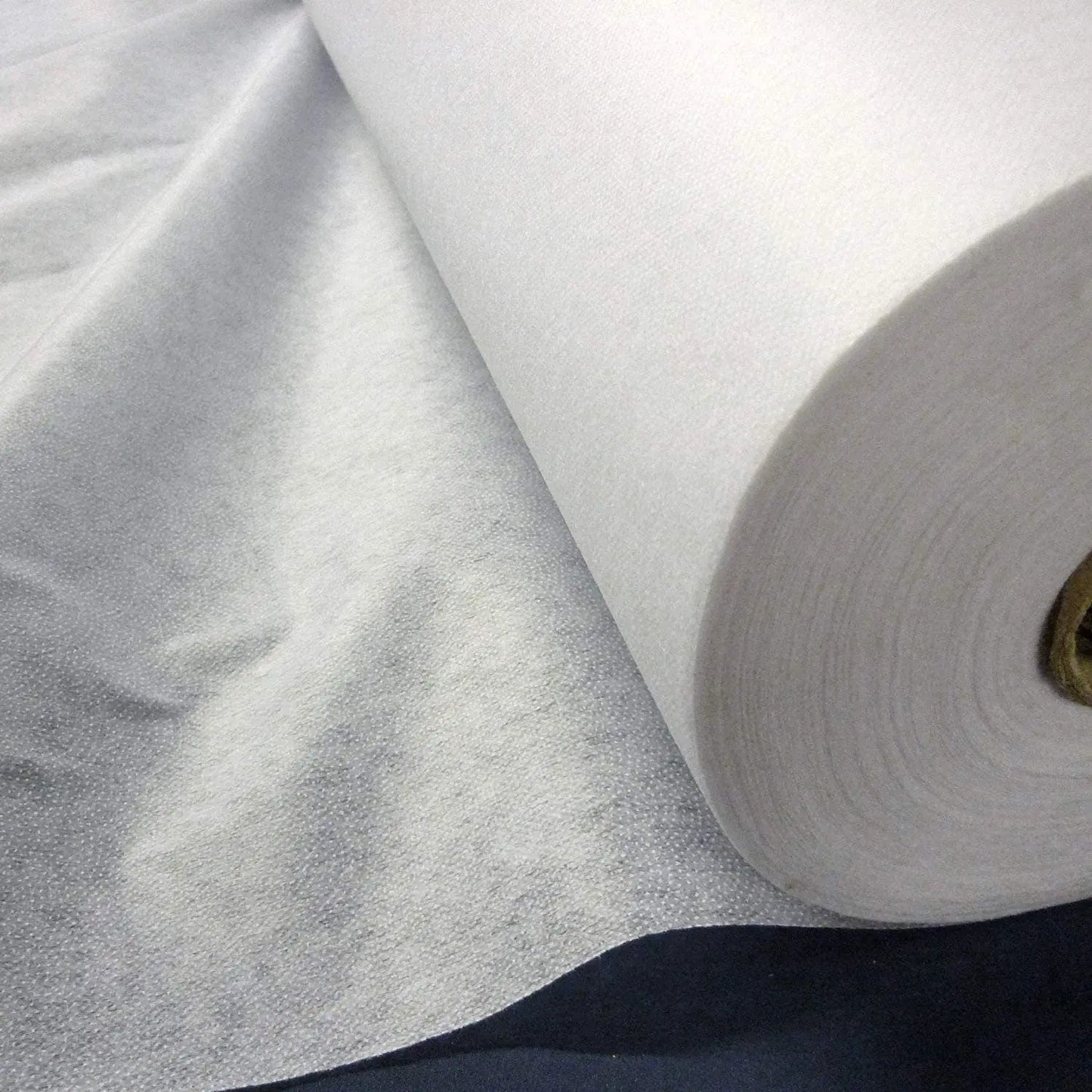 Lightweight Iron-On Interfacing | 99cm (39") Wide Non-Woven Premium Fusible Fabric β 10m Roll (White & Black)
