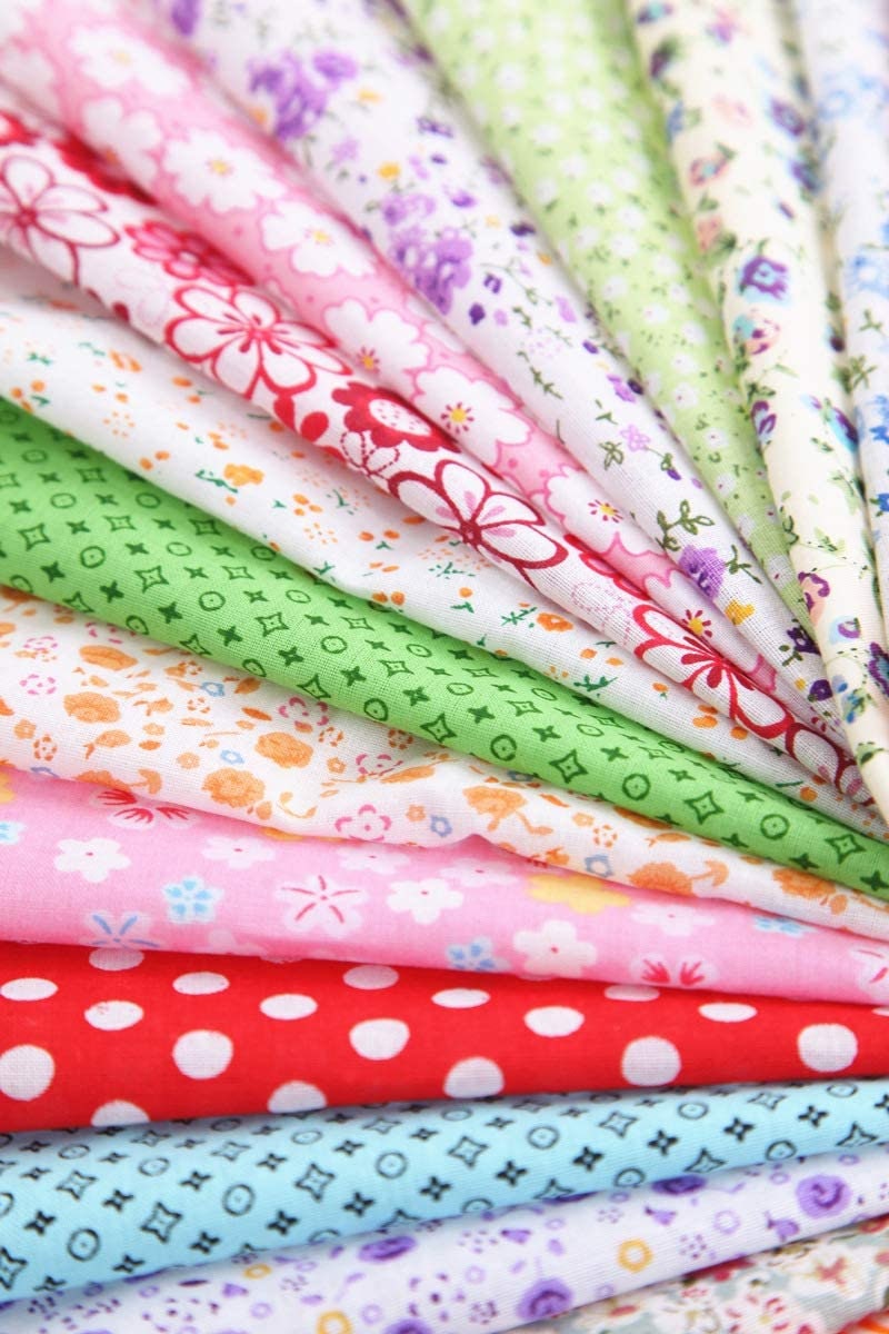 20 Piece polycotton bundle of floral's and spotty Leaves fabrics 25 cm x 25 cm
