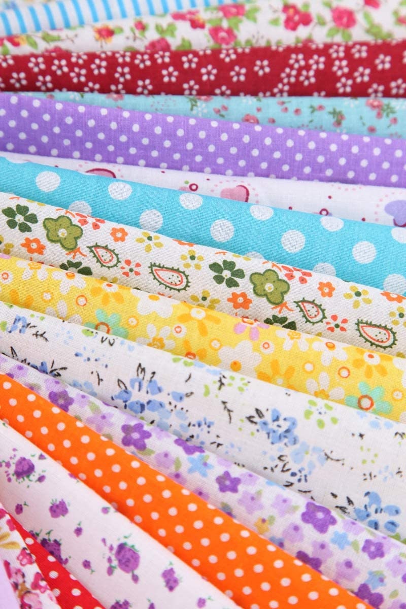 20 Piece polycotton bundle of floral's and spotty Leaves fabrics 25 cm x 25 cm