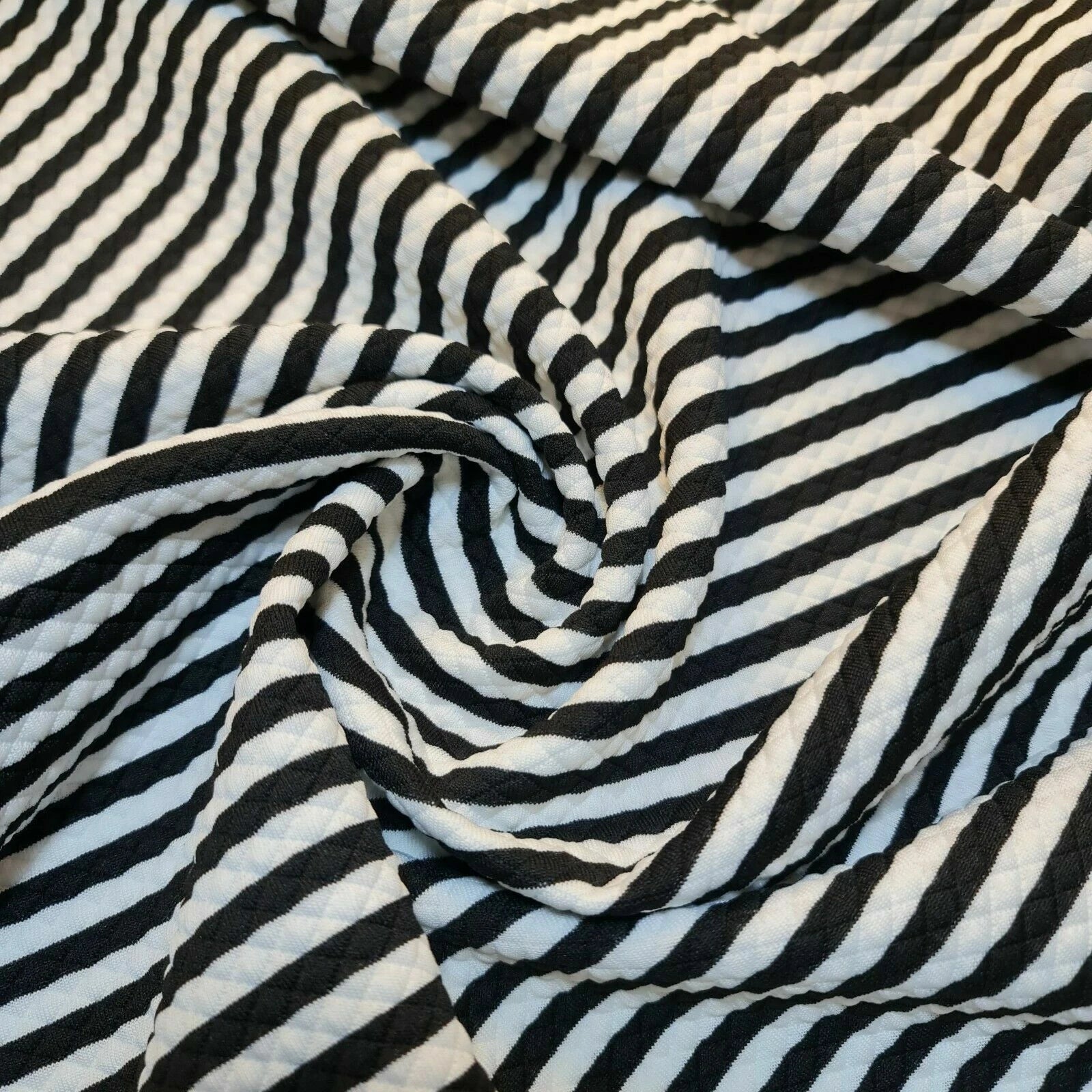 Plain & Printed Ribbed / Waffle Stretch Jersey Fabric | 58